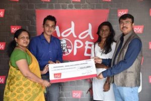kfc-india-handing-over-the-cheque-to-representatives-fro