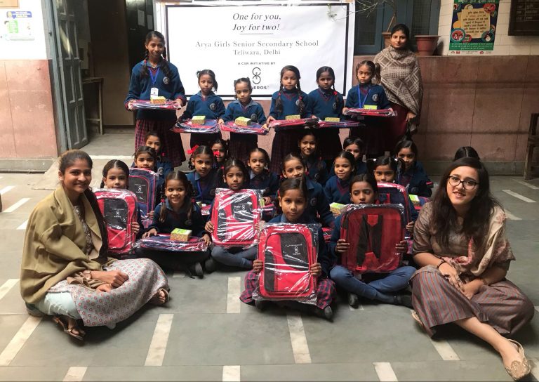 Kaeros Distribute School Bags to Girls at Arya Girls Sr. Sec. School, Delhi